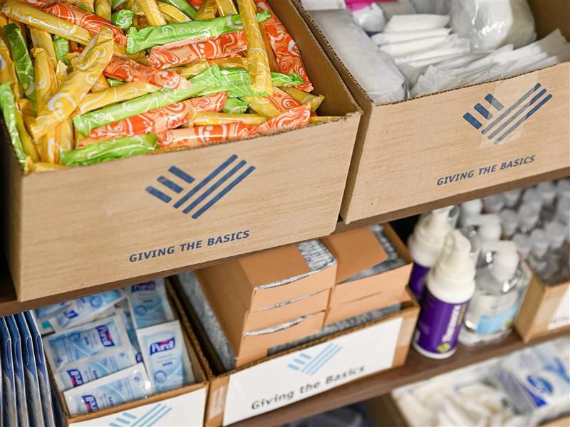 Giving the Basics hygiene products on shelves