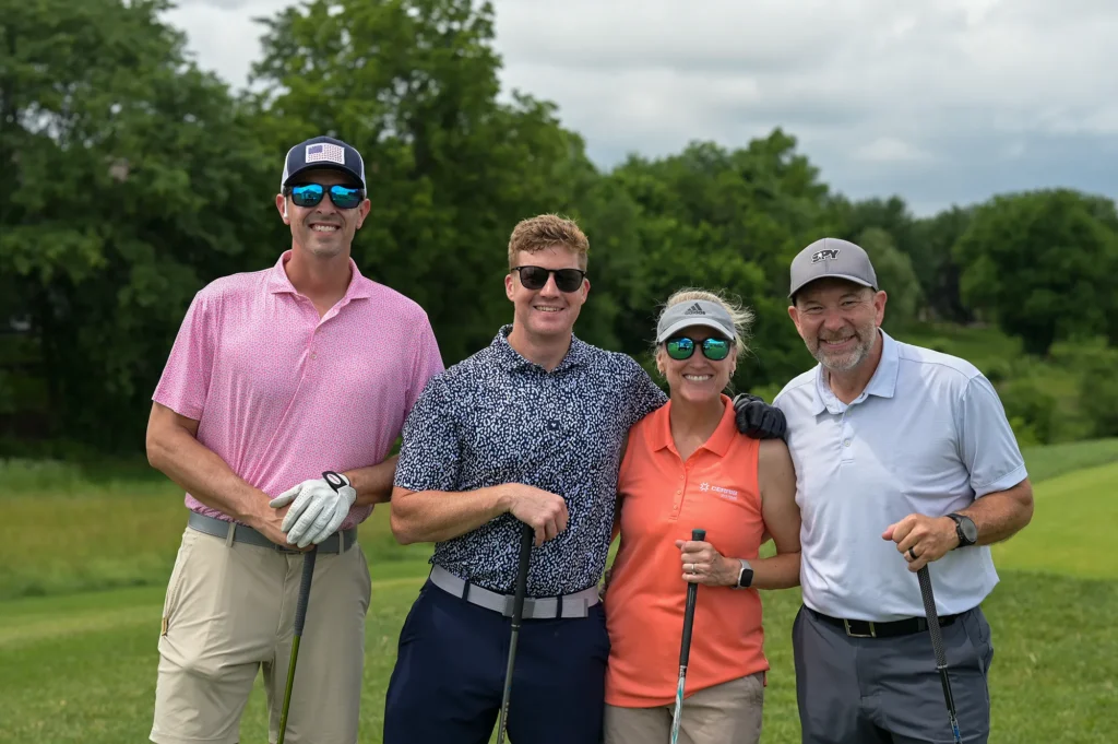 Golfers participating in the Scramble for Dignity tournament