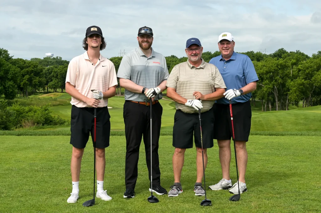 Golfers participating in the Scramble for Dignity tournament
