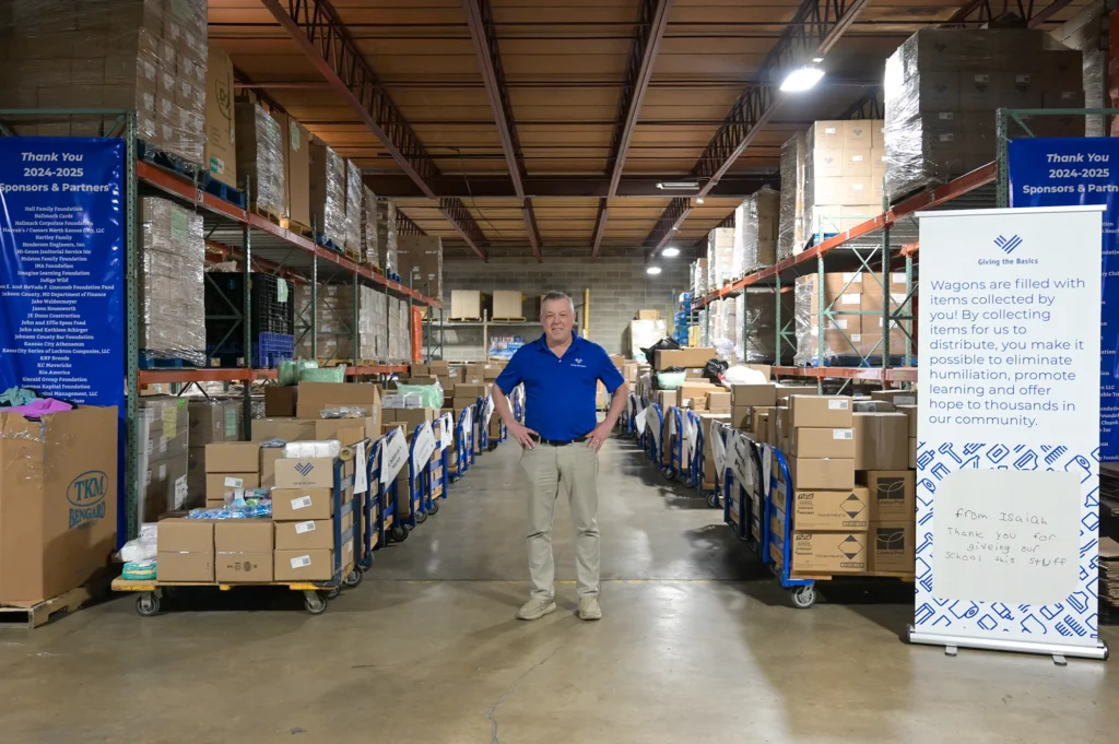 Joe In the Giving The Basics Warehouse